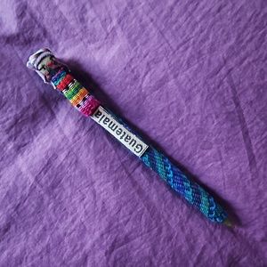 Bright, hand-embellished, woven/crochet covered pen from Guatemala